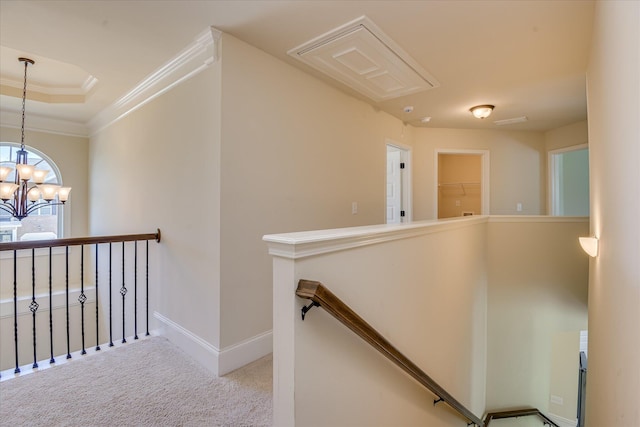 1037 Dietrich Ln, North Augusta, SC 29860 - hallway with an upstairs landing, a chandelier, carpet, ornamental molding, and baseboards