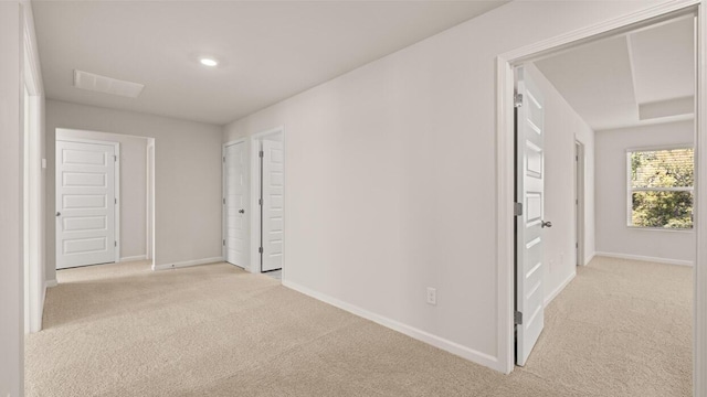 hallway featuring recessed lighting, baseboards, and carpet floors