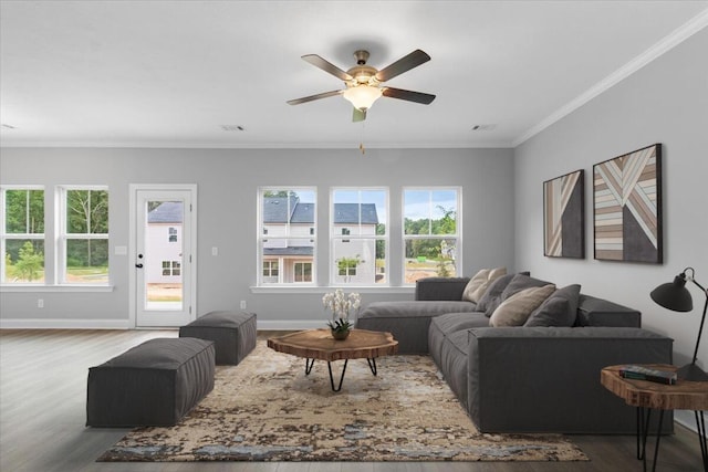 living room with crown molding, ceiling fan, and hardwood / wood-style flooring