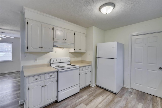 kitchen with light countertops, light wood-style flooring, white cabinetry, white appliances, and under cabinet range hood