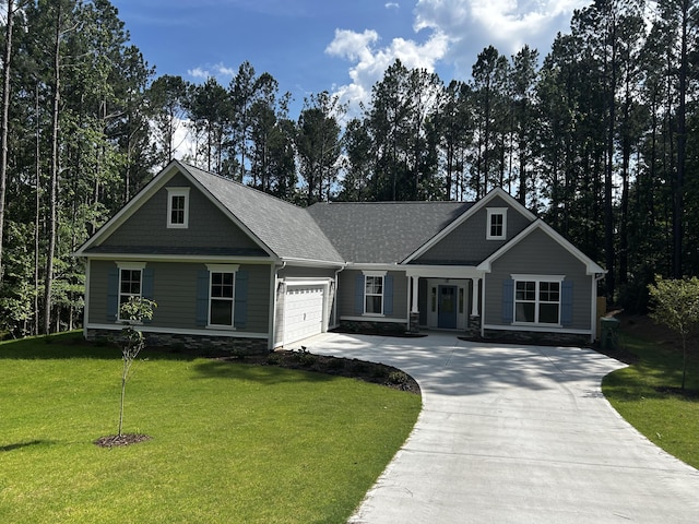 217 Holly Ln, Mccormick, SC 29835 - craftsman inspired home with concrete driveway, a front lawn, an attached garage, and roof with shingles
