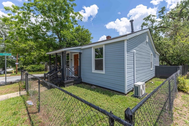 2028 Battle Row, Augusta, GA 30904 - view of front of house with a cooling unit and a chimney