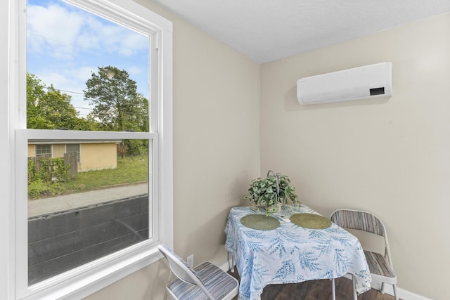 2028 Battle Row, Augusta, GA 30904 - dining area featuring an AC wall unit and baseboards