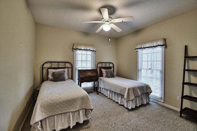 carpeted home office featuring ornamental molding