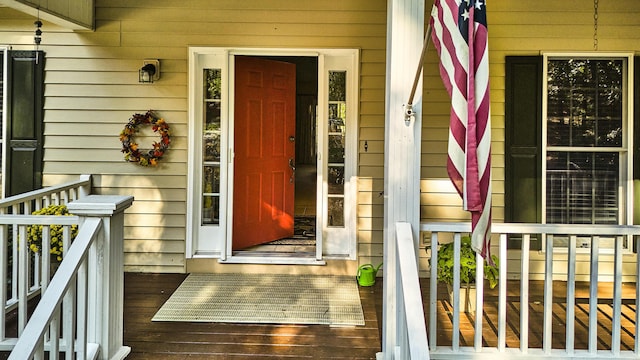 doorway to property featuring a porch