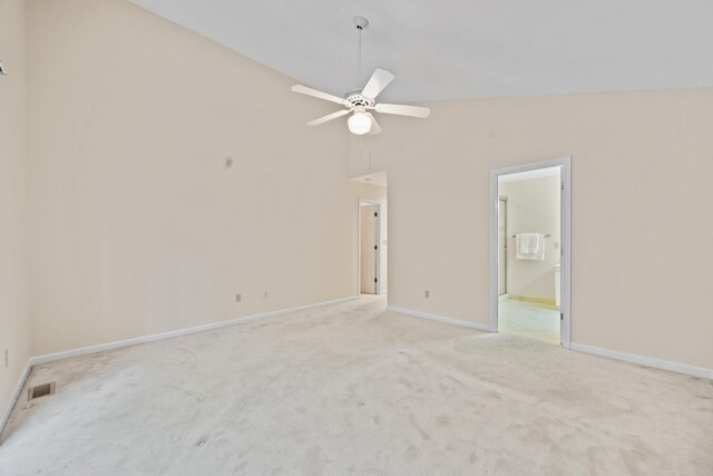 148 Crane Ct, Aiken, SC 29803 - unfurnished bedroom with light colored carpet, lofted ceiling, baseboards, ensuite bathroom, and a ceiling fan