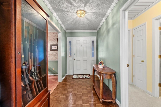 foyer entrance with dark parquet floors and crown molding