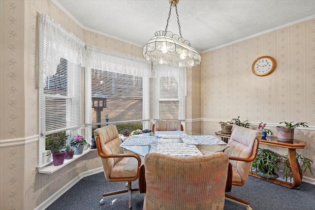 dining room featuring carpet flooring, a textured ceiling, an inviting chandelier, and crown molding