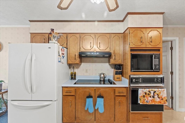 kitchen featuring black appliances, ceiling fan, crown molding, and a textured ceiling