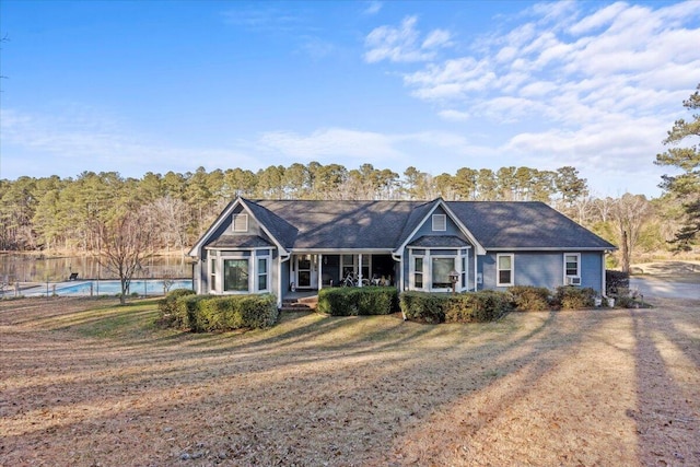 ranch-style house featuring a front lawn