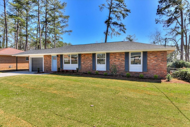 ranch-style home with a garage, driveway, brick siding, fence, and a front yard