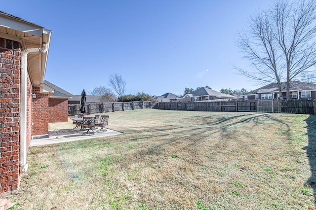 view of yard with a patio area