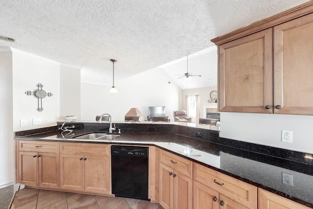 kitchen with a textured ceiling, dishwasher, dark stone countertops, and sink