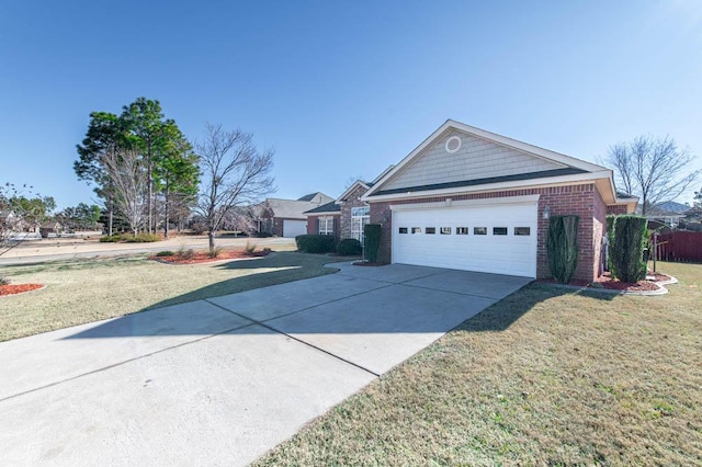 view of front of house with a garage and a front yard