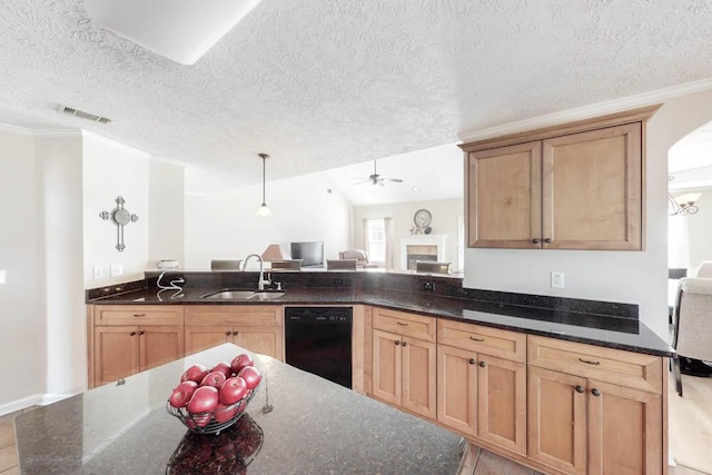 kitchen with a textured ceiling, black dishwasher, and sink