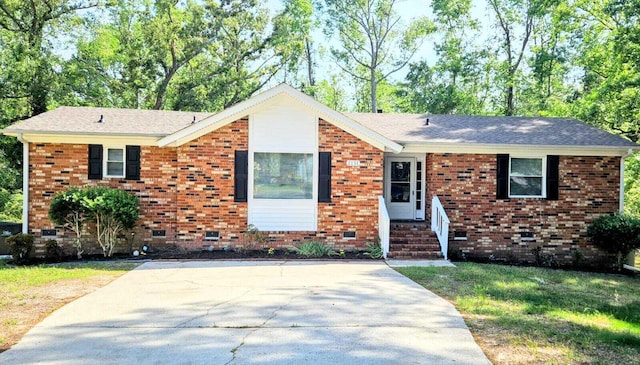 2151 Birch Ct, Augusta, GA 30906 - ranch-style home with brick siding, a front lawn, and driveway