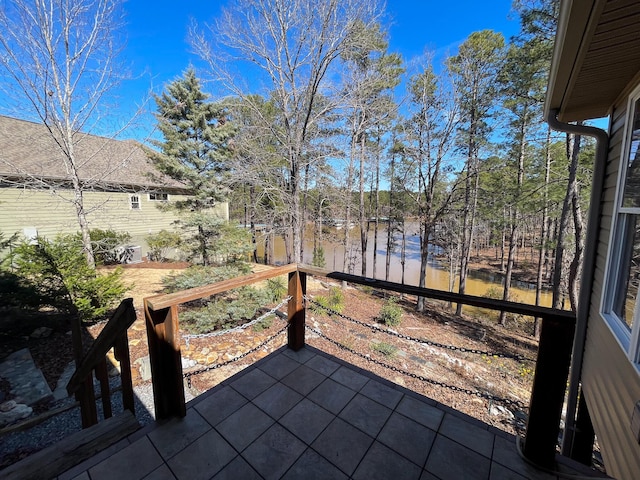 view of patio featuring a water view