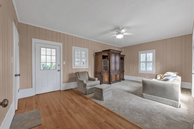 207 W Liberty St, Washington, GA 30673 - interior space featuring baseboards, a ceiling fan, crown molding, and wood finished floors