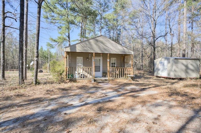 7419 Fullbright Rd, Appling, GA 30802 - view of front of property with covered porch and a storage shed