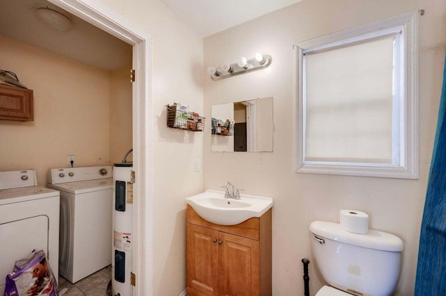 7419 Fullbright Rd, Appling, GA 30802 - bathroom with vanity, water heater, and washer and dryer