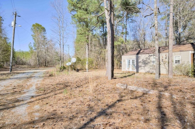 7419 Fullbright Rd, Appling, GA 30802 - view of yard featuring french doors and dirt driveway