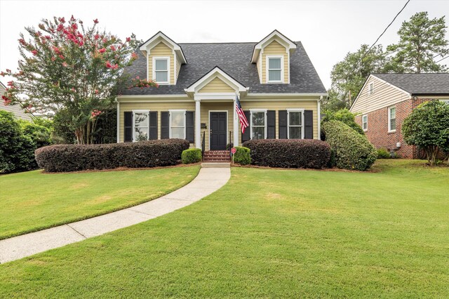 707 Hickman Rd, Augusta, GA 30904 - living area featuring a tiled fireplace, crown molding, wood finished floors, and recessed lighting