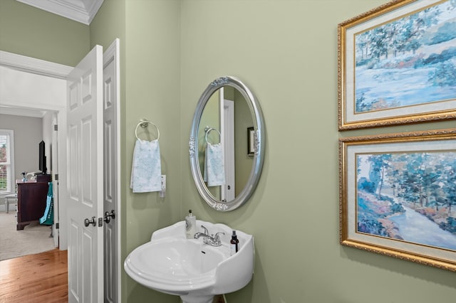 707 Hickman Rd, Augusta, GA 30904 - bathroom featuring ornamental molding and wood finished floors