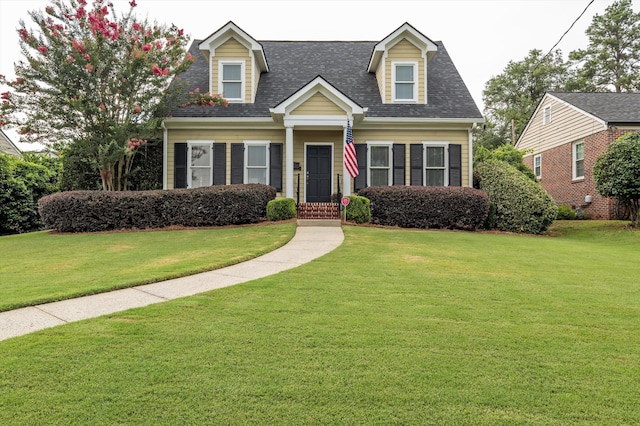707 Hickman Rd, Augusta, GA 30904 - cape cod house with a front lawn and roof with shingles