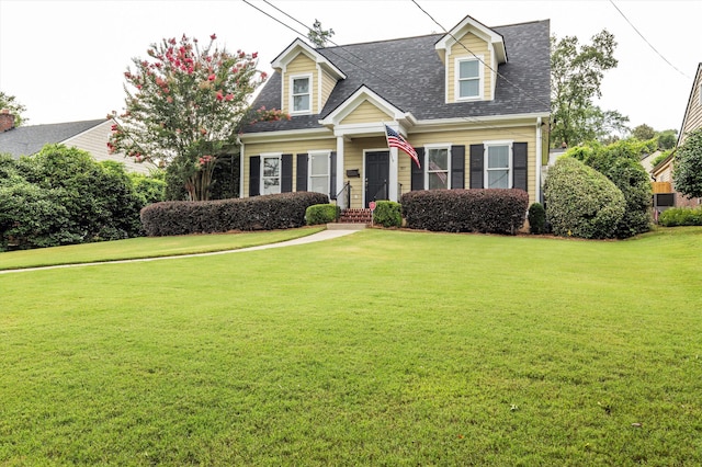 707 Hickman Rd, Augusta, GA 30904 - cape cod house with a front lawn and a shingled roof