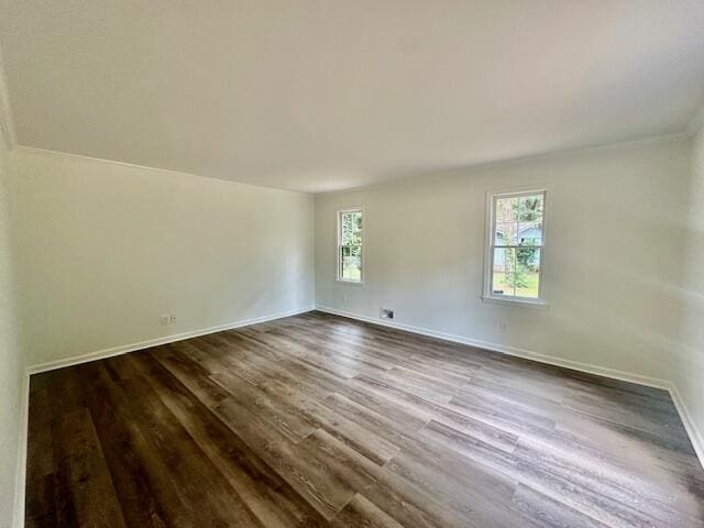 spare room featuring hardwood / wood-style flooring