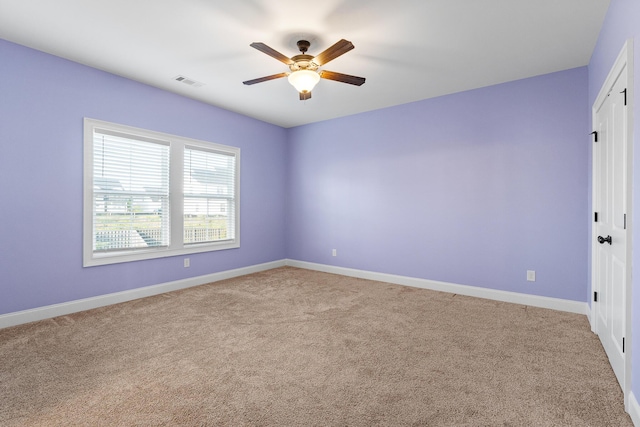 3067 Rosewood Dr, Evans, GA 30809 - spare room featuring a ceiling fan and light carpet