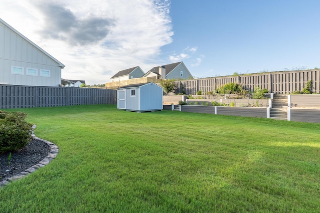 3067 Rosewood Dr, Evans, GA 30809 - fenced backyard featuring a storage shed and a vegetable garden
