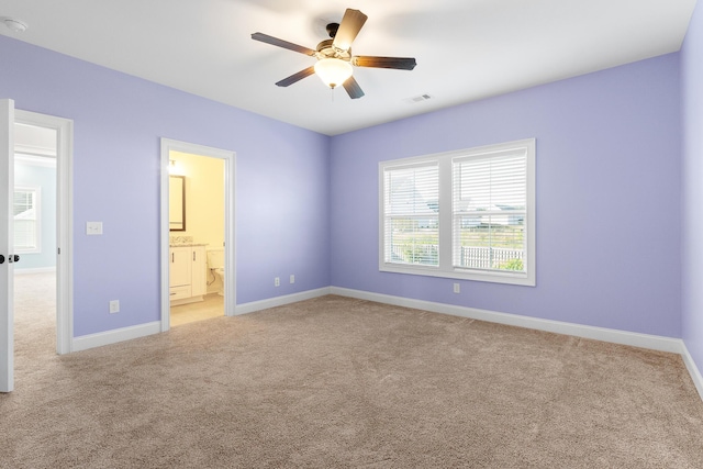 3067 Rosewood Dr, Evans, GA 30809 - unfurnished bedroom featuring light carpet, ensuite bath, and a ceiling fan