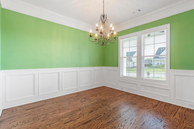 3067 Rosewood Dr, Evans, GA 30809 - unfurnished room featuring a chandelier, ornamental molding, a wainscoted wall, and wood finished floors