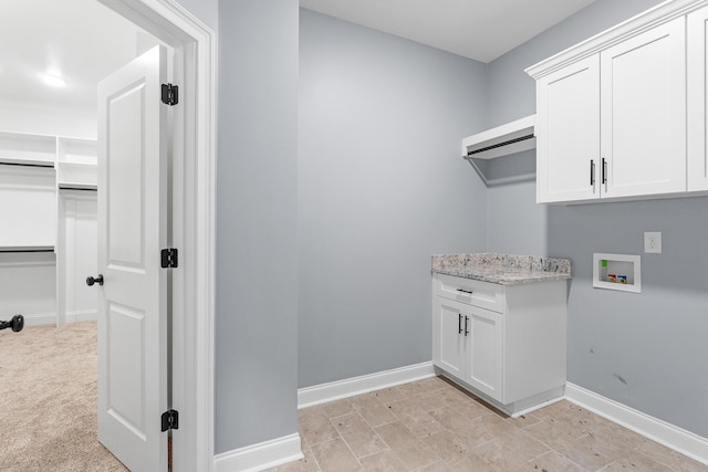 3067 Rosewood Dr, Evans, GA 30809 - washroom featuring washer hookup and cabinet space