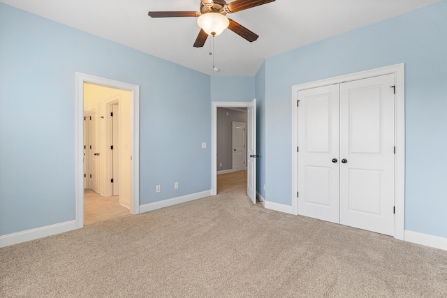 3067 Rosewood Dr, Evans, GA 30809 - unfurnished bedroom featuring light carpet, a closet, and a ceiling fan