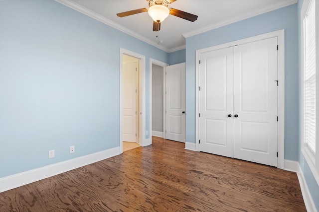 3067 Rosewood Dr, Evans, GA 30809 - unfurnished bedroom featuring ornamental molding, wood finished floors, ceiling fan, and a closet