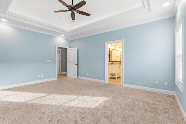 3067 Rosewood Dr, Evans, GA 30809 - unfurnished bedroom with a tray ceiling, carpet floors, crown molding, recessed lighting, and ensuite bathroom