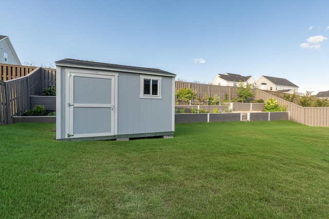 3067 Rosewood Dr, Evans, GA 30809 - view of shed with a vegetable garden and a fenced backyard
