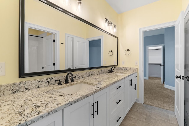 3067 Rosewood Dr, Evans, GA 30809 - bathroom featuring double vanity and baseboards