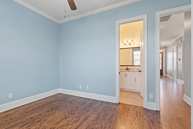 3067 Rosewood Dr, Evans, GA 30809 - unfurnished room with a ceiling fan, crown molding, and wood finished floors