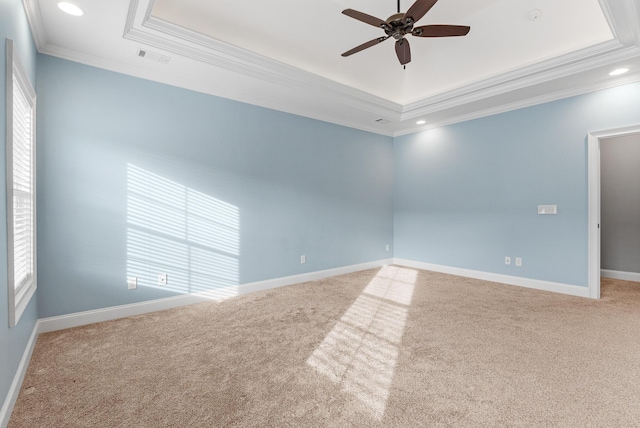 3067 Rosewood Dr, Evans, GA 30809 - carpeted empty room with a raised ceiling, ceiling fan, ornamental molding, healthy amount of natural light, and recessed lighting