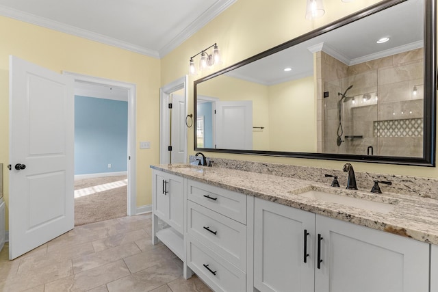 3067 Rosewood Dr, Evans, GA 30809 - bathroom featuring crown molding, double vanity, a tile shower, and recessed lighting
