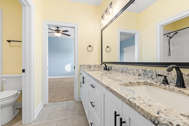 3067 Rosewood Dr, Evans, GA 30809 - bathroom with double vanity, a ceiling fan, and a shower