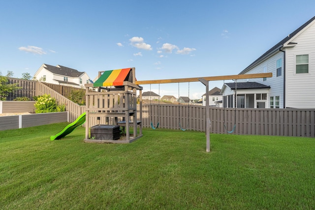3067 Rosewood Dr, Evans, GA 30809 - fenced backyard featuring a playground and a residential view