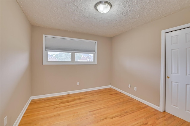 103 Adams Ln, Grovetown, GA 30813 - empty room featuring light wood-style flooring and a textured ceiling