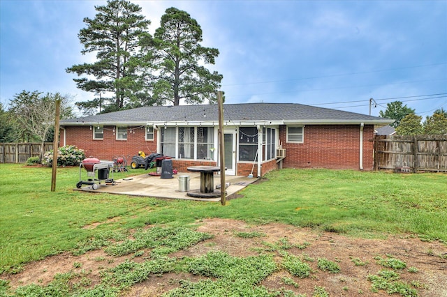 103 Adams Ln, Grovetown, GA 30813 - rear view of property featuring brick siding, a sunroom, a patio area, and roof with shingles