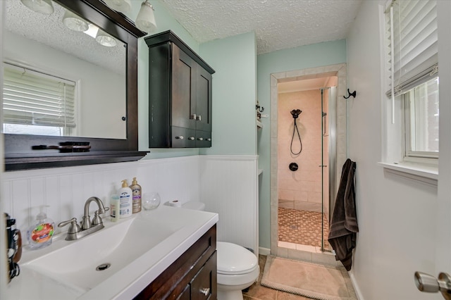 103 Adams Ln, Grovetown, GA 30813 - full bath featuring a stall shower, vanity, a textured ceiling, and tile patterned flooring