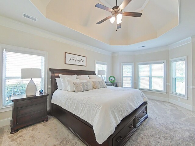 1038 Dietrich Ln, North Augusta, SC 29860 - bedroom featuring light carpet, a raised ceiling, baseboards, crown molding, and a ceiling fan