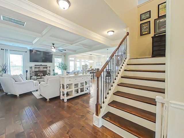 1038 Dietrich Ln, North Augusta, SC 29860 - stairs featuring coffered ceiling, a ceiling fan, a fireplace, wood-type flooring, and beamed ceiling